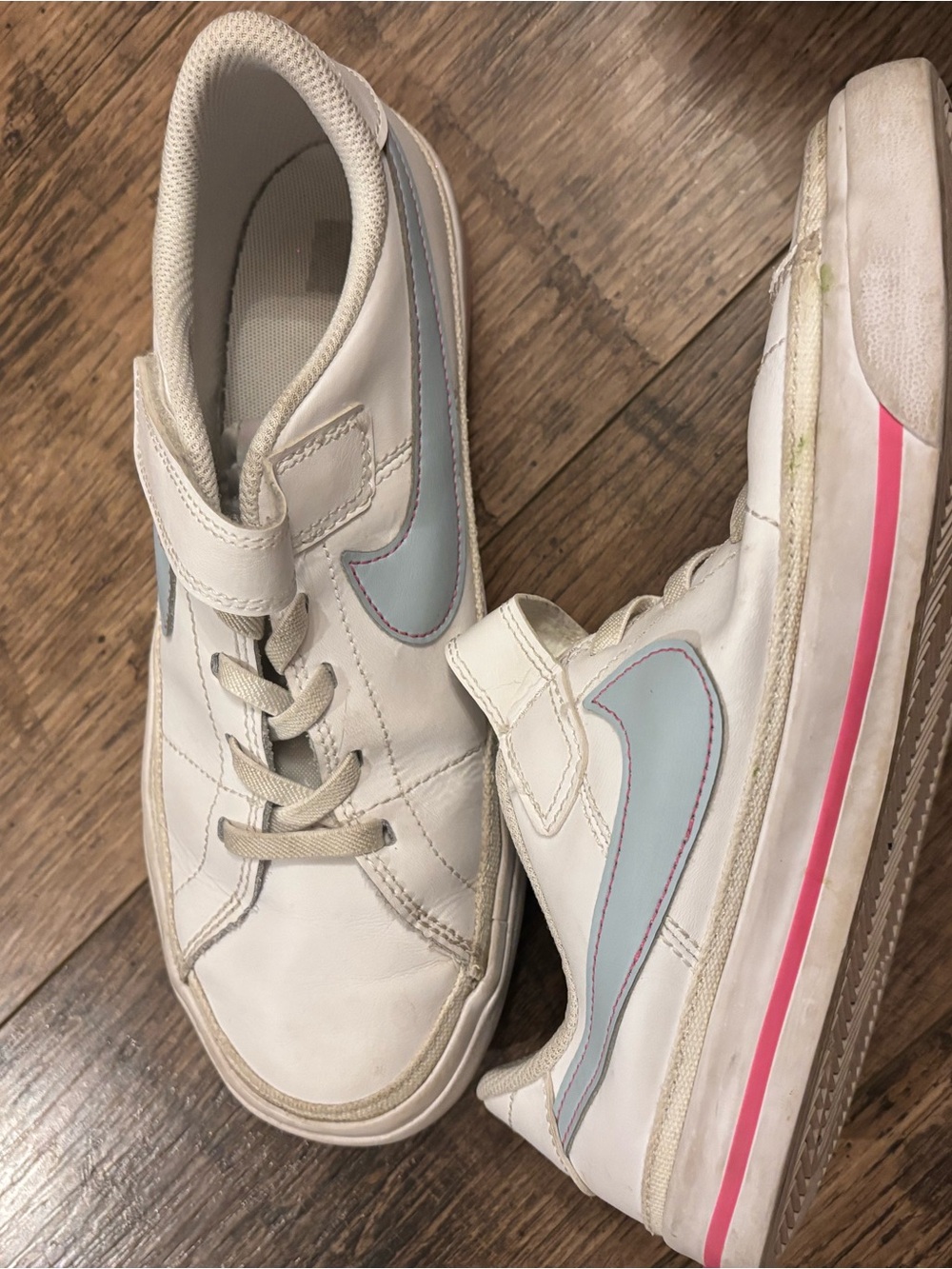 Nike Kids White Sneakers with Light Blue Swoosh and Pink Stripe